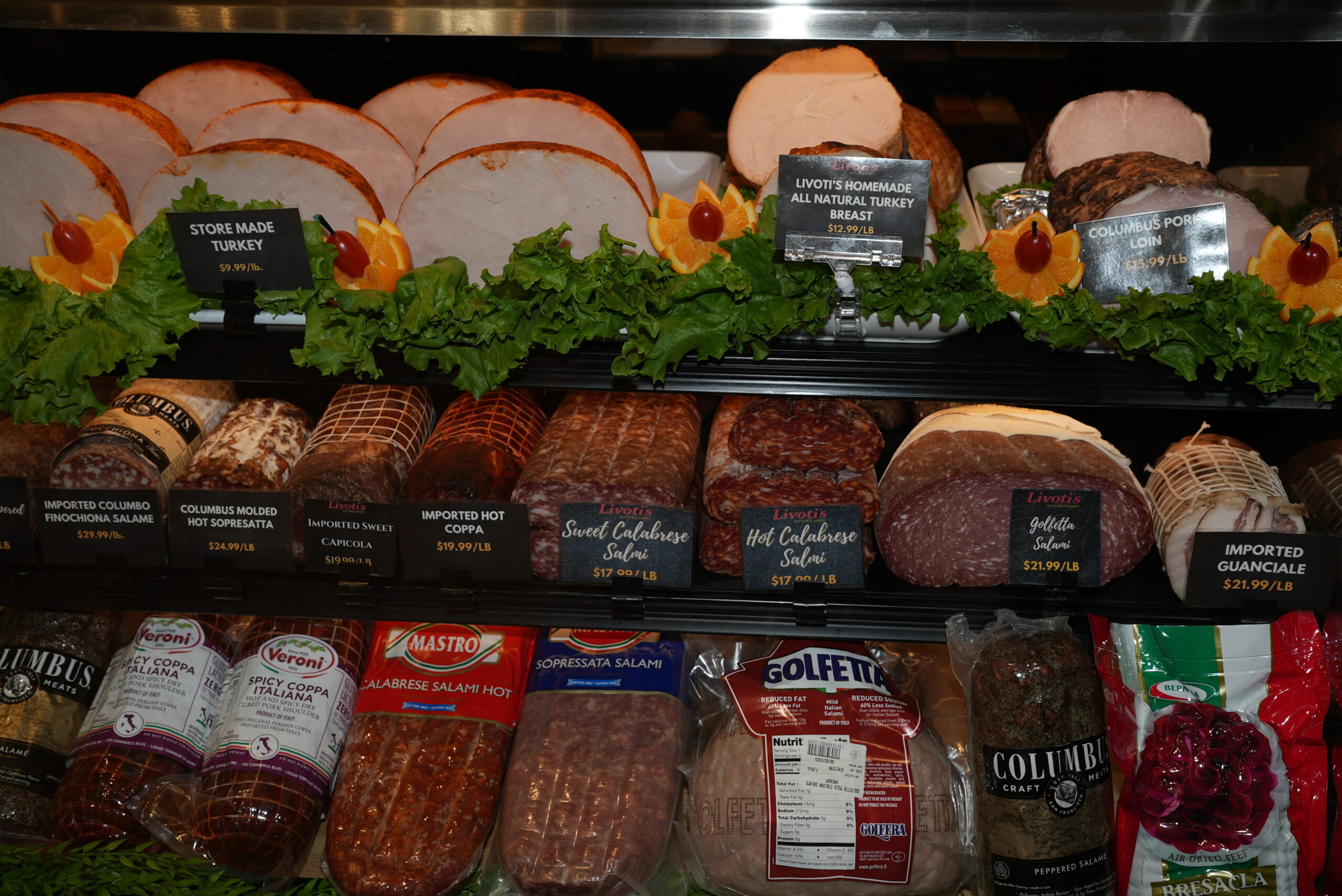 Various meats for sale in the deli case at Livoti's Old World Market in Brick