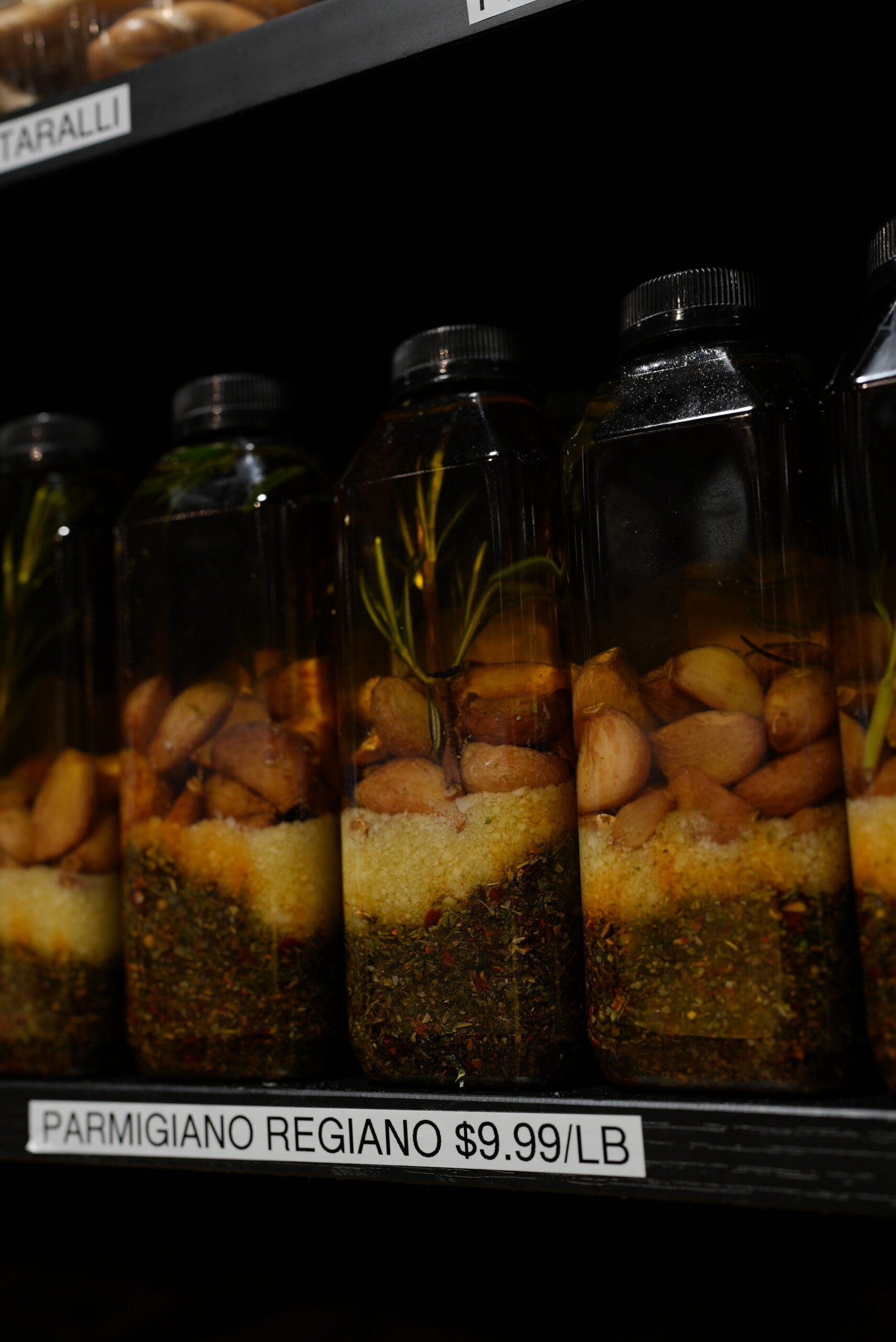 Private label dipping oil on shelves at Livoti's Old World Market